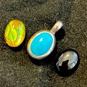 Sterling silver pendant with stones